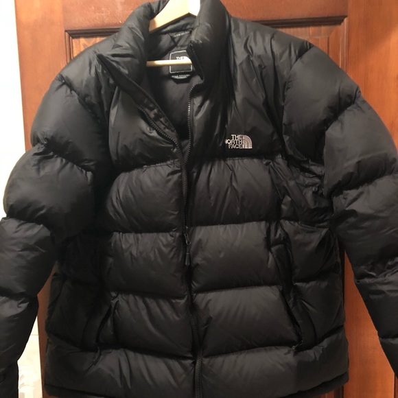 black puffy north face jacket